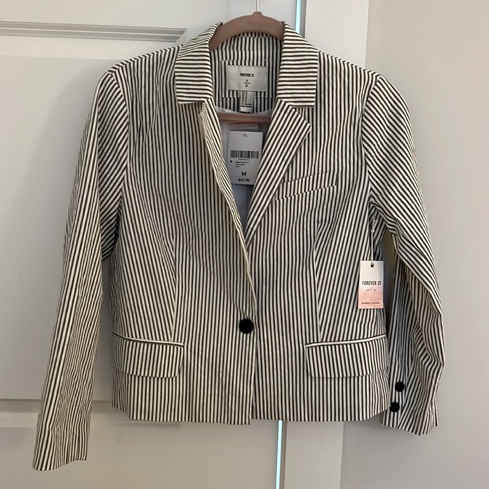 Grey and white striped woman’s  blazer